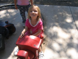 Stelli riding our train we have in the back yard. 