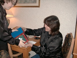 Travis giving Grandma  the birdhouse he made