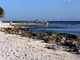 The boat dock and nearby rocky beach