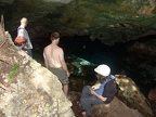 Mark, Eric, and Travis with guide climbing into a cenote (sinkhole)