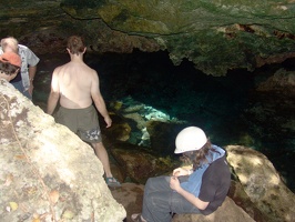 Mark, Eric, and Travis with guide climbing into a cenote (sinkhole) 2