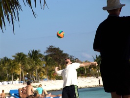 Eric serves (Dad on the right watches)