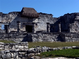 You can see clearly the height of the first floor of this building.  The thatch is protecting a mural on the second floor.