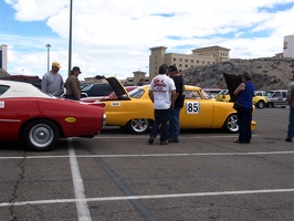 Car show the day before the race.  Please add comments to identify the cars and/or owners.