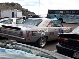 Car show the day before the race.  Please add comments to identify the cars and/or owners.