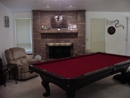 The finished living room.  I added the pool table and replaced the fireplace doors.