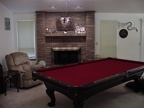 The finished living room.  I added the pool table and replaced the fireplace doors.