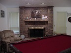 The finished living room.  I added the pool table and replaced the fireplace doors.