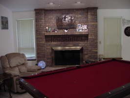 The finished living room.  I added the pool table and replaced the fireplace doors.