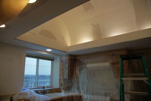 Smoothing and preparing the ceiling surface for painting, texturing of the walls