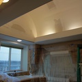 Smoothing and preparing the ceiling surface for painting, texturing of the walls