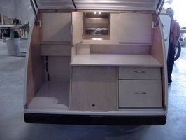 Another shot of the kitchen.  The left cubby is for a small 12-volt fridge.  The center is a large storage area.  The right two 