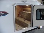 Enother shot of the &quot;couch&quot; bed.  Here you can see that the floor of the trailer is coverd with lanolium.  You can als