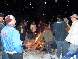 Unknown people at the bonfire