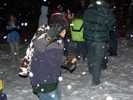 Unknown people at the bonfire